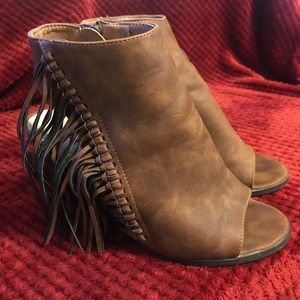 Boho style peep toe heels.